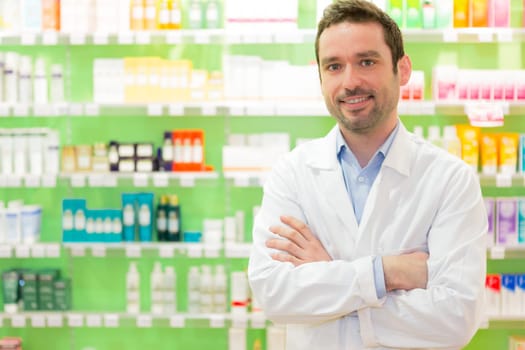 View of an attractive pharmacist at work