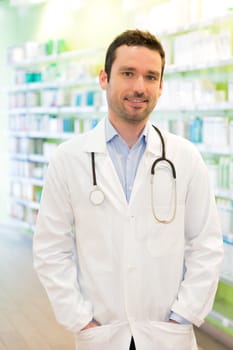 View of an attractive pharmacist at work