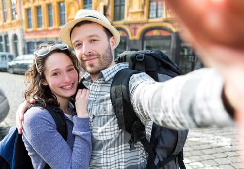 View of a Young couple on holidays taking selfie