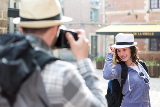View of a Man taking picture of his girlfriend on hoildays