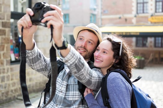 View of a Young couple on holidays taking selfie