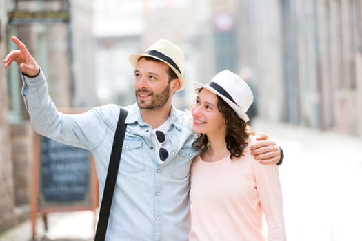 View of a Young couple visiting city during holidays