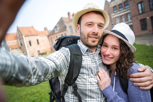 View of a Young couple on holidays taking selfie