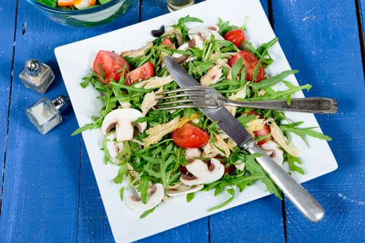 seasonal salad on the old blue table