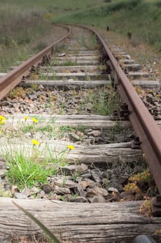 Old Wood Tie iron. Old railroad in the country