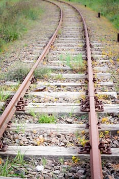Old Wood Tie iron. Old railroad in the country