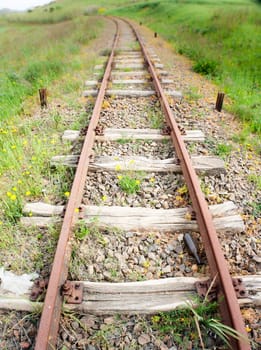 Old Wood Tie iron. Old railroad in the country