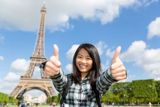 View of Young attractive asian tourist enjoying her Paris trip