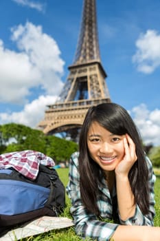 View of a Young attractive asian tourist enjoying her Paris trip