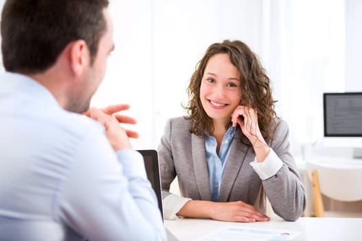View of a Young attractive woman during job interview