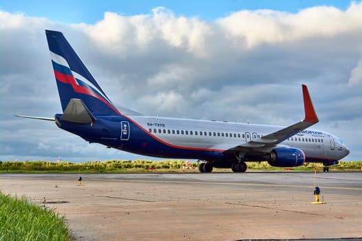 The Boeing aircraft is taxiing along the runway. Talagi Airport, Arkhangelsk, Russia, 27,08,2022. High quality photo
