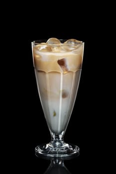 Cream and coffee ice cocktail isolated on black