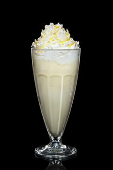 Banana milk cocktail with whipped cream