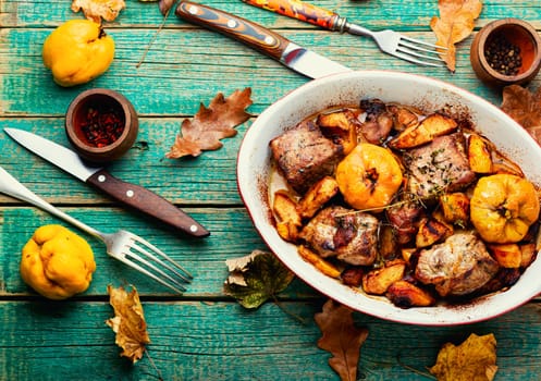Fried pork meat with autumn quince.