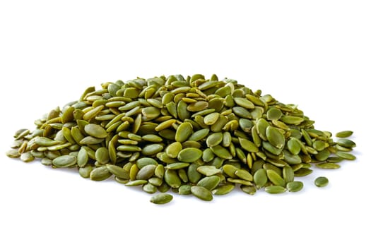 Heap of peeled pumpkin seeds isolated on white