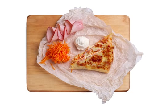 Thin pancakes stuffed with ham and spicy carrot isolated on white