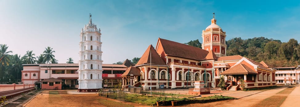 Kavlem, Phonda, Goa, India. Shree Shantadurga Mandir, Kavlem Temple. Famous Landmark And Popular Destination. White Lamp Tower. Shantadurga Devi. Panorama, Panoramic View.