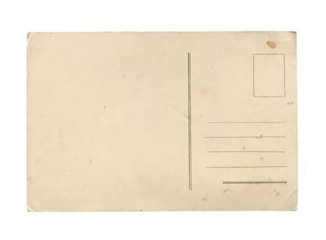 front view closeup of old vintage empty aged paper postcard texture with faded stamp print and brown stains isolated on white