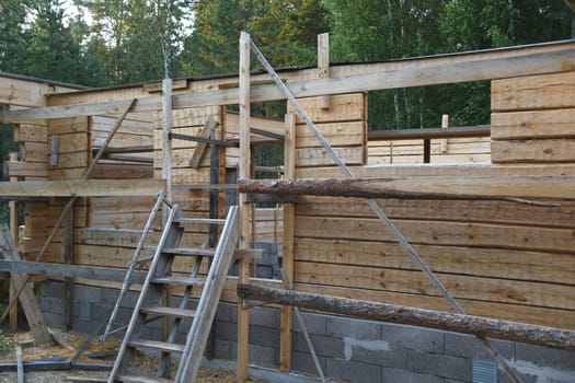 A log house is called a timmerhus in Sweden. The walls are made of pine and the roof beams are made of more flexible spruce. After assembly,the wood is painted with linseed oil,balsamic turpentine
