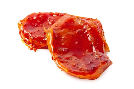 Raw piece of meat with spice and sauce prepered for barbecue. Gastronomy template isolated on white background.