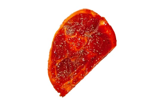 Raw piece of meat with spice and sauce prepered for barbecue. Gastronomy template isolated on white background.