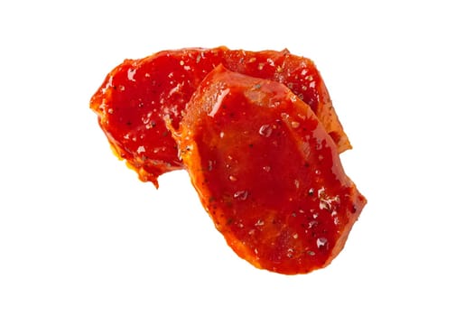Raw piece of meat with spice and sauce prepered for barbecue. Gastronomy template isolated on white background.