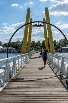 Vienna, Austria - August 10, 2022: The Viennese use them to relax, in bars and restaurants along the Old Danube or at Copa Beach and Sunken City on Danube Island.