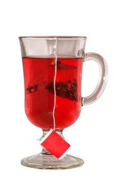 fruit tea in a transparent glass cup on a white background