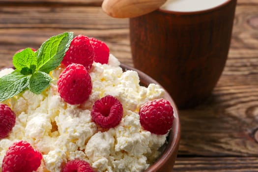 Dairy products: milk, cottage cheese, raspberry and mint.