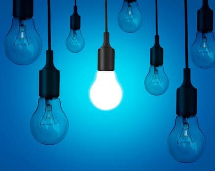 Idea idea with light bulbs on blue background