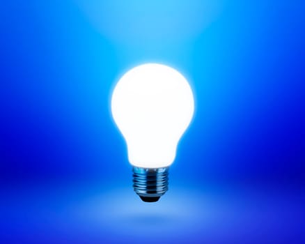 light bulb on blue background idea concept