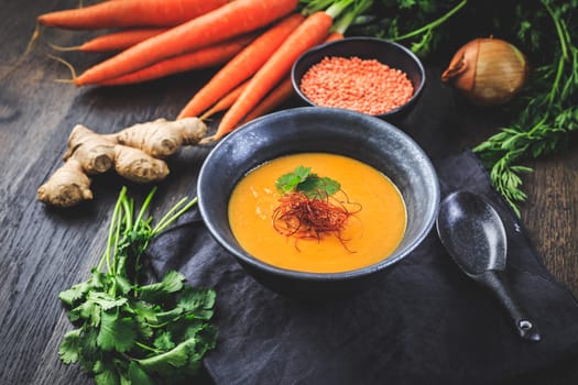 Roasted pumpkin and carrot soup with red lentils, ginger and chili