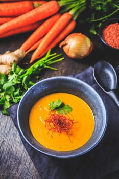 Roasted pumpkin and carrot soup with red lentils, ginger and chili