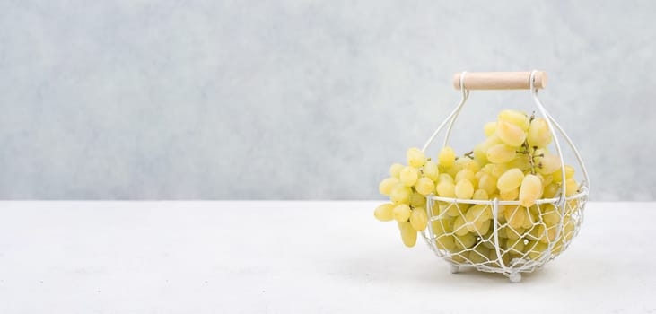 Grapes in a basket , fresh ripe fruits in autumn, healthy food