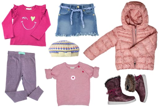 Collage set of clothes for a little girl isolated on a white background. The collection of a jeans skirt, a shirt and rain jacket, shirt and rain jacket, pants, sweater and boots.