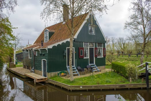 Traditional Houses in the Historic Village of Zaanse Schans on the Zaan River in the Netherlands