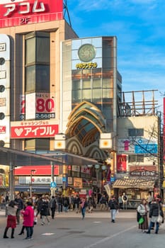 tokyo, japan - december 25 2018: Entrance of Nakano Sun Mall arcade shopping street leading to Nakano Broadway famous for Otaku subculture related shops in Tokyo.