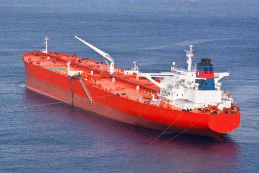Red oil tanker. Transportation by water.