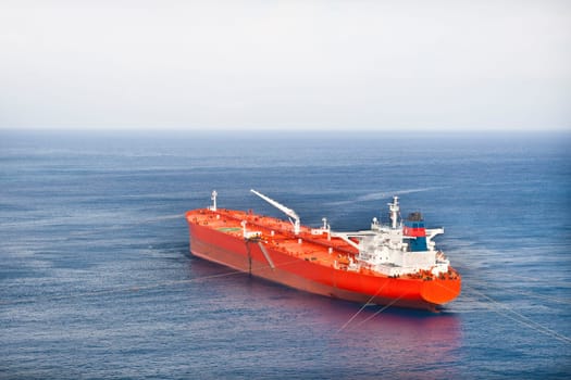 Red oil tanker. Transportation by water.