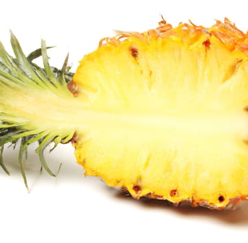 Juicy pineapple isolated on white background. The pineapple (Ananas comosus) is a tropical plant with an edible fruit  it is the most economically significant plant in the family Bromeliaceae