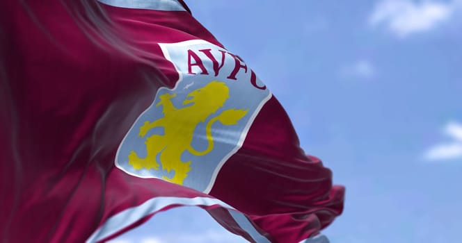Birmingham, UK, May 2022: The flag of Aston Villa Football Club waving in the wind on a clear day. Aston Villa is a professional football club based in Aston, Birmingham, England