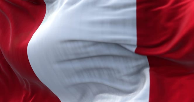 Close-up view of the Peru national flag waving in the wind. Republic of Peru is a country in western South America. Fabric textured background. Selective focus