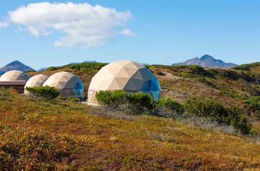 The glamping on the slope of a volcano in autumn on the Kamchatka Peninsula.