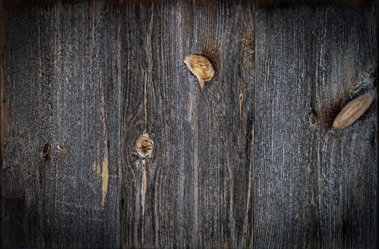 The Dark old wooden table texture background top view