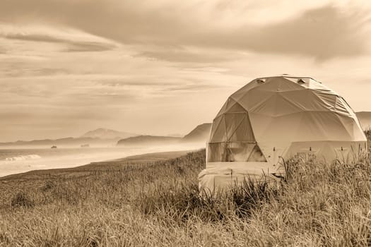 The round glamping by the sea. black and white photo