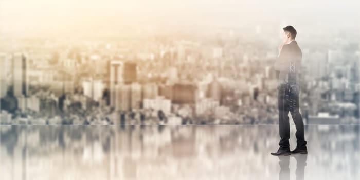 double exposure of businessman and city