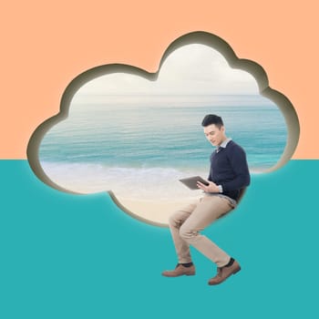 Cloud concept with man sit at a cloud shaped wall and using tablet.