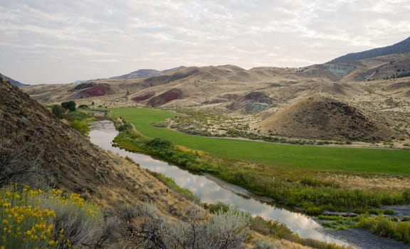 The sun readies to come up over urban landscape in the fossil beds