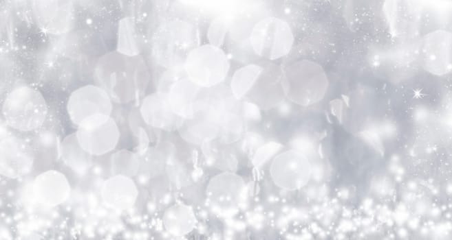 Light silver abstract Christmas background with white snowflakes