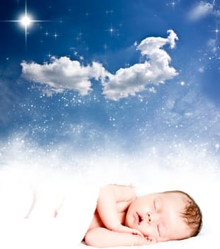Magic winter night sky background and sleeping baby
